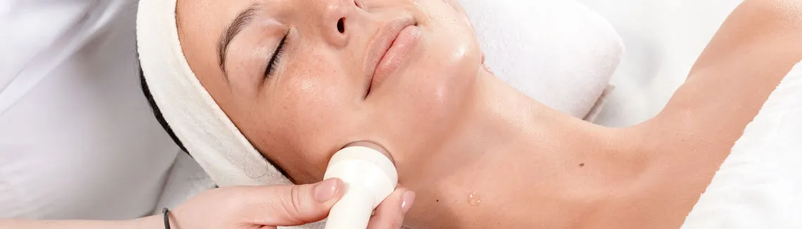 Professional facial rejuvenation treatment with advanced skincare technology at Meena Beauty Salon